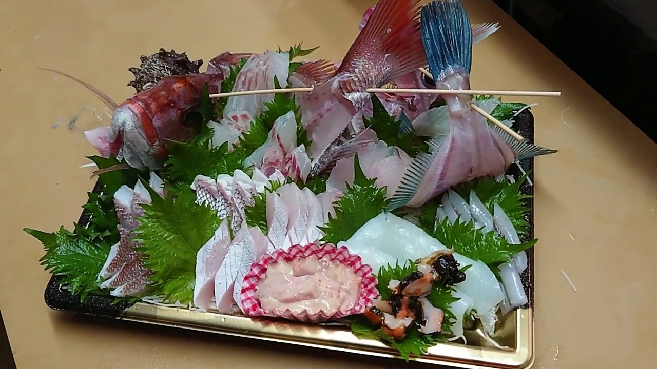 sushi tuna crossword clue