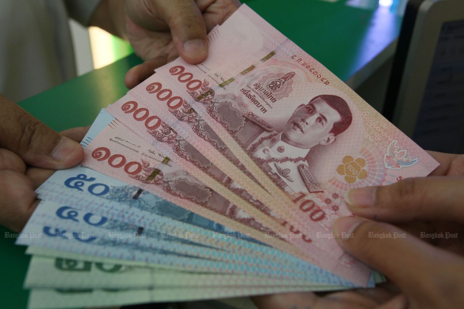 thai currency crossword clue