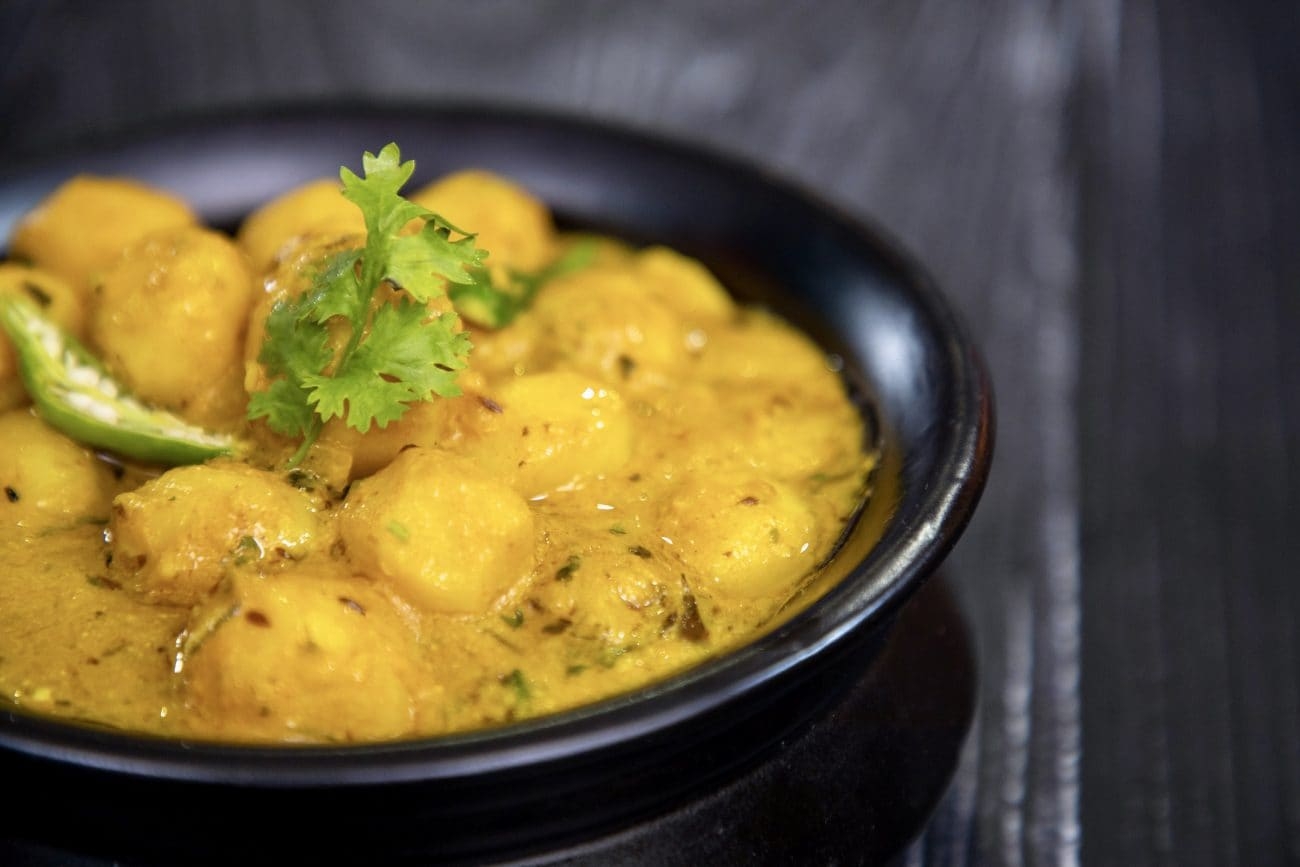 potatoes in indian cuisine crossword
