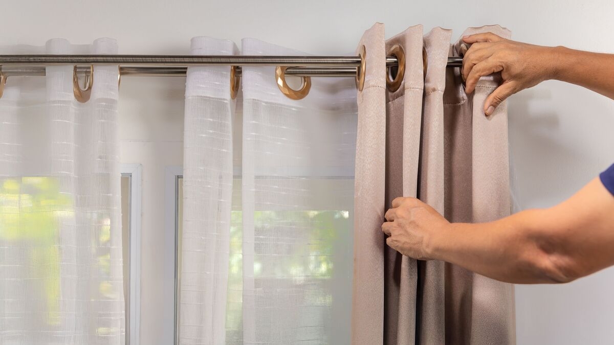 curtain fabric crossword clue